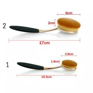 Gold oval brush with black handle