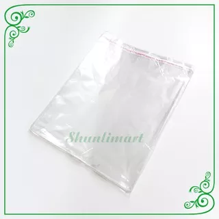 Plastik OPP Bening Kemasan Baju Plastik Seal Lem Ukuran 30 x 35 cm