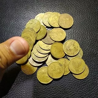 uang koin kuno 100 rupiah karapan sapi kuningan used