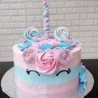 Unicorn cake with candy lollypop