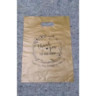 Plastik Thank YOU  plong Ukuran 25 X 35