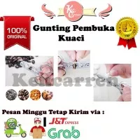 Gunting kuaci kacang kacangan alat pembuka